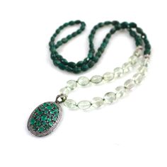 "Very gorgeous, finely faceted Green Emerald stones are exceptional gems full of shine, sparkle and amazing natural color. They are embellished with a stunning large faceted Emerald and quite luxe black diamond pendant from which hangs a strand of finely faceted prasiolite. The pale green finely faceted stones throw off beautiful light. Small diamond set beads add a bit of elegance to the strand which finishes with vibrant faceted nuggets of green emeralds, The length is 27\" long and has no cla Elegant Rondelle Crystal Necklace For Healing, Luxury Pendant Jewelry With Stones, Oval Crystal Jewelry With Stones, Luxury Diamond Necklace As Gift, Luxury Green Stone Necklaces, Elegant Rondelle Emerald Necklace With Natural Stones, Luxury Emerald Necklace With Stones, Luxury Faceted Emerald Jewelry, Luxury Silver Emerald Gemstone Necklace