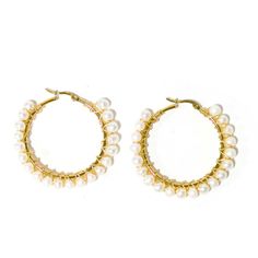 Round hoop earrings adorned with faux pearls. Pearl Hoop Earrings, Faux Pearl, Hoop Earrings