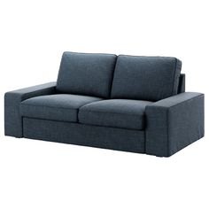 a blue couch sitting on top of a white floor