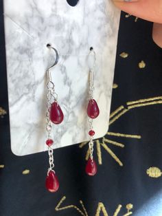 Twilight-inspired earrings, great for a vampire-ish edge to your outfit. Earring hooks are plated in silver. Made thoughtfully in Eugene, OR. Blood Drop Earrings, Blood Drop Necklace, Blood Earrings, Handmade Black Vampire Earrings, Vampire Earrings, Blood Drop, Droplet Earrings, Earring Hooks, Jewelry Earrings Dangle