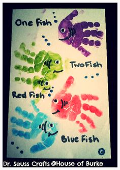 two fish and one fish handprints on a piece of paper