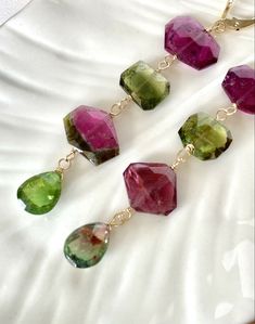 "Natural Tourmaline (27.1ct) 14k Yellow Gold \"Wind Chime\" Dangle Earrings, New* These beautiful and unique earrings feature large and high quality, tourmaline gemstones in varying shades of pink and green. The earrings have been carefully handcrafted at our shop using high quality tourmalines (27.15 ctw): 4pcs trapezoid 10x13mm rose-cut beads in dark pink rubelite and watermelon, 2pcs bright green indicolite rectangular 8x10mm rose-cuts, and 2pcs green and watermelon pear-shaped 8x10mm drops. Jewelry 2023, Tourmaline Earrings, Stylish Earrings, Tourmaline Jewelry, Stylish Earring, Pink Jewelry, 925 Silver Jewelry, Wind Chime, Tourmaline Gemstone