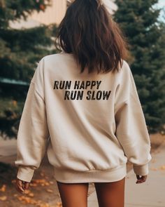 Show off your love for running and going your pace. Life is not a race! Perfect for workouts or casual wear, it's a must-have for runners! Front or back print possible! ♥PRODUCTION TIME: 1-5 days (usually 2-3 days) ♥SHIPPING TIME: 2-5 days (usually 3 days) ♥PRODUCT DESCRIPTION: Gildan Unisex Crewneck / Sweatshirt Super soft cotton and excellent quality print makes. Medium-heavy fabric blend of 50% cotton and 50% polyester (fibre content may vary for different colors) (8.0 oz/yd² (271.25 g/m Runs Sporty Running Activewear With Letter Print, Sporty Activewear With Letter Print For Running, Sporty Letter Print Activewear For Running, Crew Neck Activewear With Text Print For Workout, Casual Letter Print Activewear For Running, Casual Activewear With Letter Print For Running, Relaxed Fit Sports Activewear With Text Print, Sporty Letter Print Tops For Running, Athleisure Text Print Sweatshirt For Sports