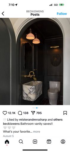 the bathroom is decorated in black and white marble