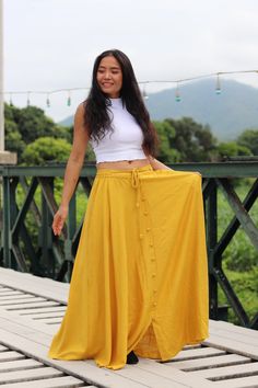 All items are shipped Thailand Post.Free upgrade when you buy 2 items to D.H.L express.The USA only. Please leave a phone number with orders. US sizing fits XS - L please check the sizes in inches in the description. The skirt comes with the free yellow top as pictured bust 30'' inches to 38'' inches Full-length skirt in Organic Hemp and Cotton Mix. Three-quarters elastic waist with drawstring ensuring a great fit and half lined.Decorative button running from the center waist to the hemline that Yellow Skirt For Festival, Yellow Long Skirt For Festival, Yellow Long Skirt For The Beach, Yellow Cotton Maxi Skirt With Lining, Flowy Yellow Lined Maxi Skirt, Yellow Long Wrap Skirt, Yellow Maxi Full Skirt, Yellow Cotton Flowy Maxi Skirt, Yellow Flowy Cotton Maxi Skirt