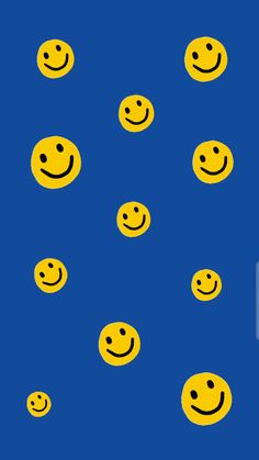 many yellow smiley faces on a blue background