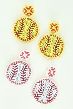 Discover the perfect accessory for game day with our Ball Beaded Embroidery Drop Earrings, handmade with precision and style. These earrings are 2.5 inches in height and 1.5 inches in width, making them the ideal size for showing off your love for softball, baseball, and little league! With their unique seed bead design, they're sure to make you stand out as a dedicated fan and lover of all things athletic. Add a touch of novelty to your outfit with these stunning beaded earrings. Find more styl Embroidered Beaded Earrings, Seed Bead Volleyball, Mickey Beaded Earrings, Baseball Beaded Earrings, Nfl Beaded Earrings, Beaded Earrings Native, Bead Designs, Softball, Beaded Embroidery