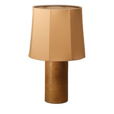 a table lamp with a brown shade on it's base and a white background