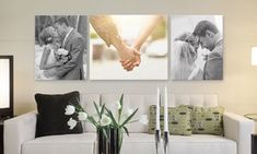 a living room filled with furniture and pictures hanging on the wall above a coffee table