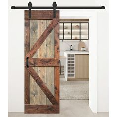 an open sliding barn door in a kitchen