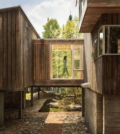 the house is made out of wood and has an open floor plan that allows for people to walk through it