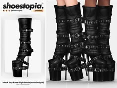 a pair of black high heeled boots with straps and rivets on the sides