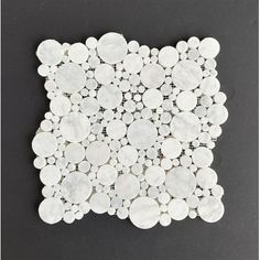 White Carrara mixed size bubble round mosaic tile in honed finish. Looks great for your bathroom floor and shower floor. Size: 13" x 13".  Color: Gray. Bathroom With Pebble Floor, Porcelain Tile Shower Floor, Bubble Tile, Pebble Mosaic Tile, Pebble Floor, Mosaic Rocks, Pebble Mosaic, Best Floor Tiles, Beige Marble