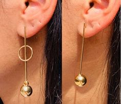 Gold Filled Bar Circle Ball Drop Earrings. Approximately 65mm Long. The perfect pair for a Simple White Tank or Little Black Dress. Material: 18 Karat Gold Filled, Hypoallergenic. Tarnish Resistant. Gold-filled does not de-laminate or peel like Gold plated Jewelry nor does it tarnish as readily as silver. Generally speaking, gold filled is better quality and will have a much longer lasting color than plated jewelry. We recommend keeping abrasive chemicals away from the jewelry for the items to l Modernist Earrings, Threader Earrings Gold, Minimalist Earrings Gold, Gold Dangle Earrings, Ball Drop, Evil Eye Earrings, Protection Necklace, Earrings Dainty, Alessandra Ambrosio