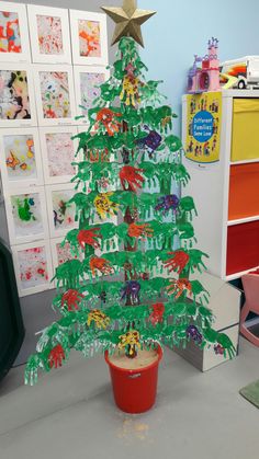 a christmas tree made out of construction paper