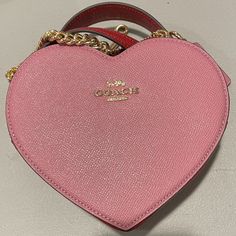 This Listing Is For A Brand New Only Removed From The Package For Photos Coach Purse. It Is A Heart Shaped Purse In Pink And Red Colorblock With A Removable Chain And Leather Strap. This Purse Is Sold Out Everywhere! Tags Still Attached. Amazing Valentine's Day Gift For Anyone!! So Super Cute. Luxury Pink Bag For Valentine's Day, Pink Coach Bag For Valentine's Day, Chic Coach Heart-shaped Bag, Luxury Coach Bags For Valentine's Day, Coach Heart-shaped Bag For Valentine's Day, Designer Red Bags For Valentine's Day, Heart Shaped Purse, Heart Aesthetic, Heart Purse