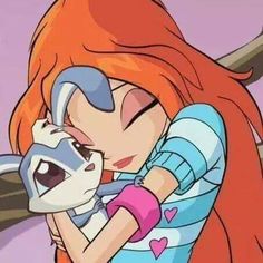 an anime character hugging another character with her arm around her head and holding a stuffed animal