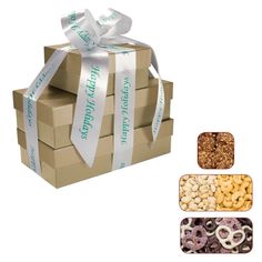 three boxes with different types of pretzels in them and ribbons tied around the top