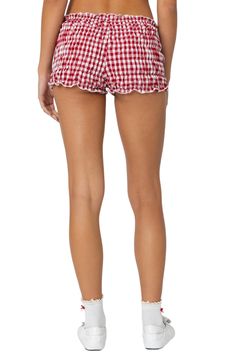 Ruffle-trimmed edges add flouncy charm to these abbreviated shorts with shirred panels and finished in a gingham print. Elastic waist 100% polyester Machine wash, dry flat Imported Reveal Outfits, Red Gingham Top, Random Clothes, Gingham Skirt, Contemporary Accessories, Gingham Shorts, Gingham Tops, Red Gingham, Birthday Photo