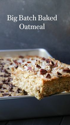 a big batch baked oatmeal in a baking pan with one slice taken out