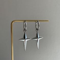 - These Star Earrings are perfect for anyone looking to add a hint of grunge to their look, incredibly unique cool girl vibe star hoops.  -These earrings are made entirely of stainless steel, making them hypoallergenic, TARNISH-FREE, as well as lead and nickel-free. 💕 - Lightweight, super comfortable to wear.  - Versatile, you can take out the star charms if you are in the mood for simple plain huggie, add stars to be more fun! -Shipping: All orders will be shipped out within 1-2 business days after the order has been received. Ship from New York, United States. USPS first class mail on this order. 🚗 - For matching necklace:  https://www.etsy.com/listing/1773704379/chunky-star-stainless-steel-layered - Thank you for visiting my listing. - Follow us on Instagram: funbeadsbygrace for more Silver Star-shaped Hoop Earrings, Silver Hoop Earrings With Star Charm For Party, Silver Star Hoop Earrings For Parties, Silver Star-shaped Hoop Earrings For Party, Silver Star Shaped Hoop Earrings For Party, Star Charm Hoop Earrings For Party, Star-shaped Hoop Earrings With Star Charm For Party, Trendy Party Hoop Earrings With Star Charm, Trendy Hoop Earrings With Star Charm For Party