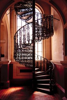 a spiral staircase in an old building