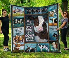 two women holding up a blanket with cows on it and the words love you at the cows come home