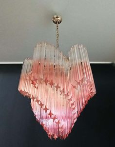 a pink chandelier hanging from the ceiling