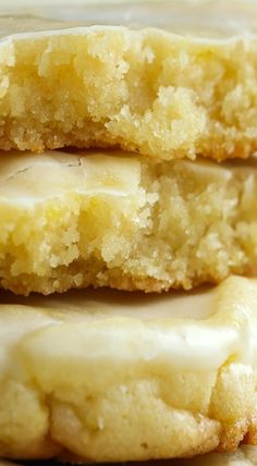 three lemon shortbreads stacked on top of each other with icing and sprinkles