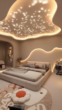 a large bed sitting under a ceiling with lights on it's headboard and foot board