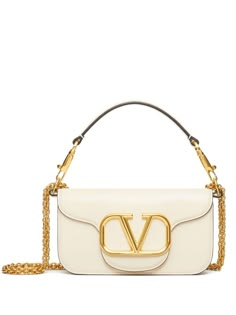 small Locò shoulder bag from VALENTINO GARAVANI featuring ivory white, leather, VLogo Signature, single detachable top handle, detachable chain-link shoulder strap, foldover top with magnetic fastening, main compartment, internal slip pocket, internal logo stamp and gold-tone hardware. Valentino Garavani Bag, Luxury Bags Collection, Bag Stand, Pretty Bags, Valentino Bags, Small Shoulder Bag, Bags Designer Fashion, Branded Bags, Ivory White