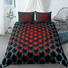 a bed with red and black circles on it