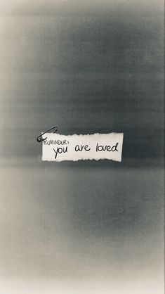 a piece of paper with the words reminders you are loved written on it in black and white