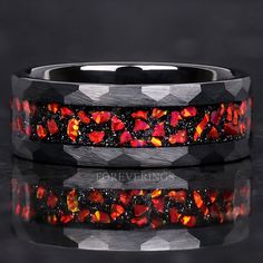 Introducing our Red Nebula Opal Ring for Men. This 8mm black tungsten band features a striking crushed red fire opal inlay, a rugged brushed and hammered finish, and a comfortable flat profile. Ideal for weddings, anniversaries, or special occasions, it makes a bold and stylish statement. ►Material: Tungsten Carbide and Crushed Opal Inlay ►Color: Red Nebula Inspired ►Comfort Fit ►Band width: 8mm ►Fit is true to size. ►Your crushed opal inlay is protected with a coating that defends it from water, dirt, and grime.  ✓ 100% Cobalt-Free ✓ Hypoallergenic ✓ Comfort Fit ✓ Free Ring Box ✓ Free Shipping within the US ✓ Ready to ship next business day Custom Engraving Add-On Link Below. Engraved rings are final sale. https://www.etsy.com/listing/1344222867 ►Your tungsten ring will not turn green its Opal Ring Men, Red Nebula, Red Engagement Ring, Rp Outfits, Red Opal, Black Tungsten Rings, Tungsten Rings, Opal Band, Fire Opal Ring