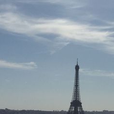 the eiffel tower towering over the city of paris