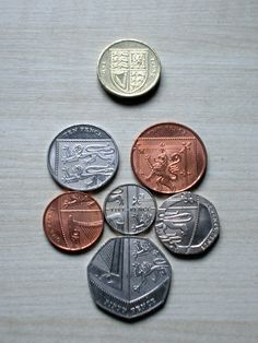 five different types of coins on a table