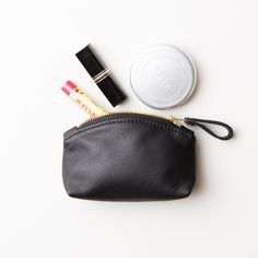 "This mini clutch is a great little cosmetics pouch to organize your essentials in a larger bag. It's also a perfect bridesmaid gift or any special someone. It's individually handcrafted with your choice of SIX butter soft cowhide leather colors (black, navy, dark brown, red, burgundy or light tan). Would you like to add a monogram, name or word to this mini clutch? If so, please take a look at the listing below. You can add foil embossed letters to this clutch. https://etsy.me/2V9cw4m * Do you Chic Bags With Coin Pocket For Gift, Elegant Everyday Pouch With Coin Pocket, Chic Gift Bags With Coin Pocket, Compact Bags With Coin Pocket As Gift, Compact Bag With Coin Pocket For Gift, Chic Compact Coin Purse For Daily Use, Elegant Compact Coin Purse For Everyday Use, Chic Compact Coin Purse, Portable Clutch Pouch For Gift