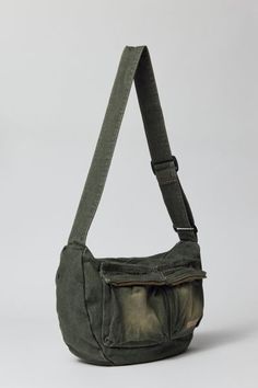 Acid wash crossbody bag by UO's own BDG label. Durable cotton canvas bag with zippered pockets and an adjustable webbing shoulder strap. Urban Outfitters exclusive. Features Crossbody bag from BDG Acid wash cotton canvas Utility style pockets Adjustable webbing strap UO exclusive Content + Care 100% Cotton Spot clean Imported | BDG Acid Wash Crossbody Bag in Olive, Men's at Urban Outfitters Men Bag Aesthetic, Aesthetic Crossbody Bag, Men’s Bags, Cross Body Bag Men, Bf Fits, Men Tote Bag, Gifts For Young Men, Men Crossbody Bag, Vintage Canvas Bags