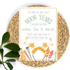 an image of a birthday party card on a basket with flowers and leaves around it