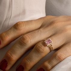 GEMSTONE: Nano Pink Sapphire : 7.00 mm x 5.00 mm     SETTING TYPE: Halo Setting GEMSTONE: zirconia  1,10mm x 1,10mm     SETTING TYPE: Prong Setting CRAFTED: in 10K, in 14K and in 18KYellow Gold with proper 10K, 14K and 18K stamp. DELIVERY: Free delivery with UPS. 2-3 days to the U.S.A. and EUROPE EXCELLENT GIFT: simply "Thinking of You" for birthday, anniversary, holidays, stocking stuffers, graduation, Christmas, Valentine's Day, Mother's Day, promise, engagement RECYCLED PACKAGING: All of our Pink Diamond Ring, Pink Sapphire Ring, Halo Setting, Pink Jewelry, Pink Ring, Pink Diamond, Pink Sapphire, Prong Setting, Rings Statement