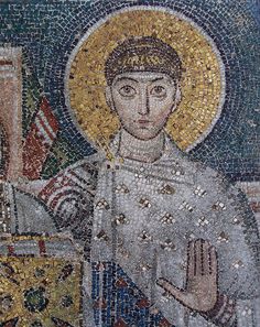 an image of jesus in the middle of a mosaic tile wall with gold and blue accents