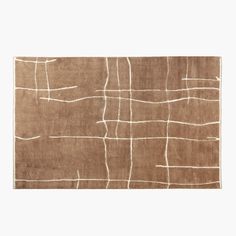 a brown rug with white lines on it