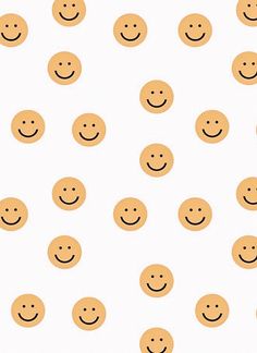 a white background with lots of brown smiley faces