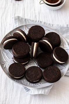 chocolate cookies and cream sandwiches on a plate