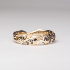 a close up of a ring on a white surface