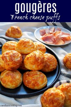 french cheese puffs on a black plate with bacon in the background and text overlay