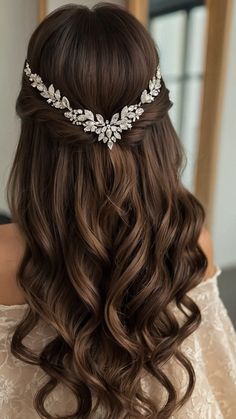 the back of a woman's head wearing a bridal hair comb