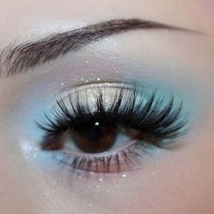 Light Blue And Silver Wedding Dress, Light Blue Wedding Makeup, Light Blue And White Makeup Looks, Frosted Blue Eyeshadow, Light Blue Smokey Eye, Winter Formal Makeup For Blue Eyes, Blue Fairy Makeup Looks, Light Blue Quinceanera Makeup, Light Blue Eyeshadow Looks