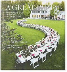 a large table set up in the middle of a lawn