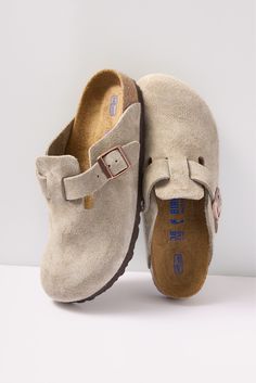 These iconic Birkenstock clogs are an easy, effortless favorite, featuring soft taupe suede, a comfy cork footbed, and an adjustable buckle for the perfect fit. At the heart of every Birkenstock design is the legendary footbed. The details are all in the design; each element of the footbed serves a purpose to encourage proper foot health. The result is signature style coupled with all-day comfort. | BIRKENSTOCK Women's Boston clog, Size 39, Taupe House Slippers Birkenstock, Wool Birkenstock Boston, Fur Lined Boston Birkenstock, Birkenstock Potato Shoes, Birkenstock Boston Felt, Berlin Stock Clogs, Birkinsoks Clogs, Birkenstock Boston Stone, Birk Clogs